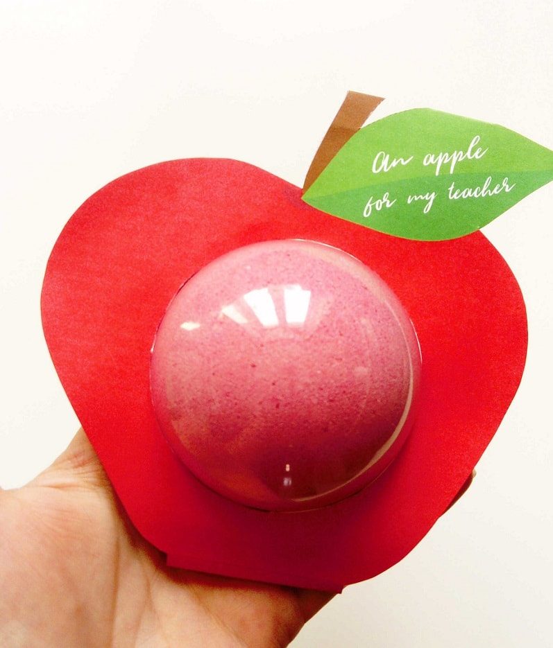 Free printable bath bomb holder ina  shape of red apple designed to be presented as a homemade teacher gift