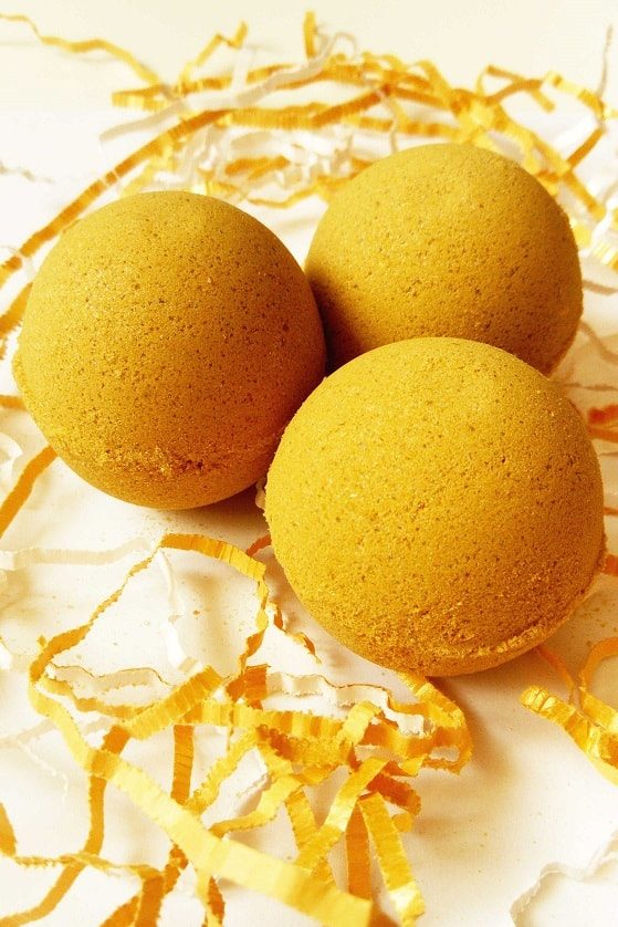 DIY bath bombs dark yellow color ready to be painted in gold