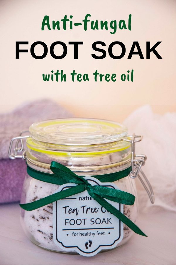 Anti-fungal foot soak with tea tree oil. This DIY foot soak is very easy to make and only takes 5 minutes. homemade foot soak recipe for athlete's foot in a jar with green labels