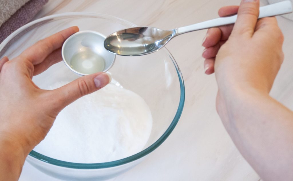 dilluting tea tree oil in sweet almond oil combining sweet almond oil with tea tree oil and peppermint essential oil and adding this mixture to foot soak mixture
