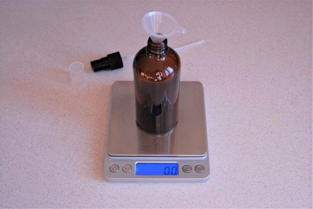 Measuring ingredients for homemade hair spray for dry hair Measuring ingredients for homemade hair spray for dry hair