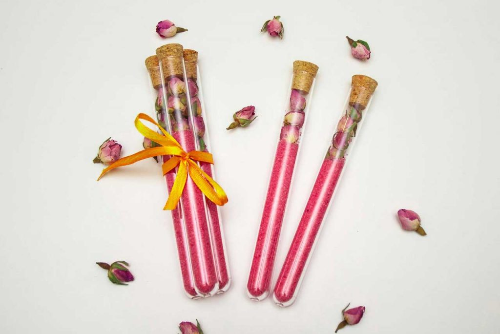 pink DIY rose bath salts in tubes as cute DIY gifts or favors