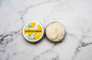 Container with homemade cuttcile cream showing consistency and label with lemons