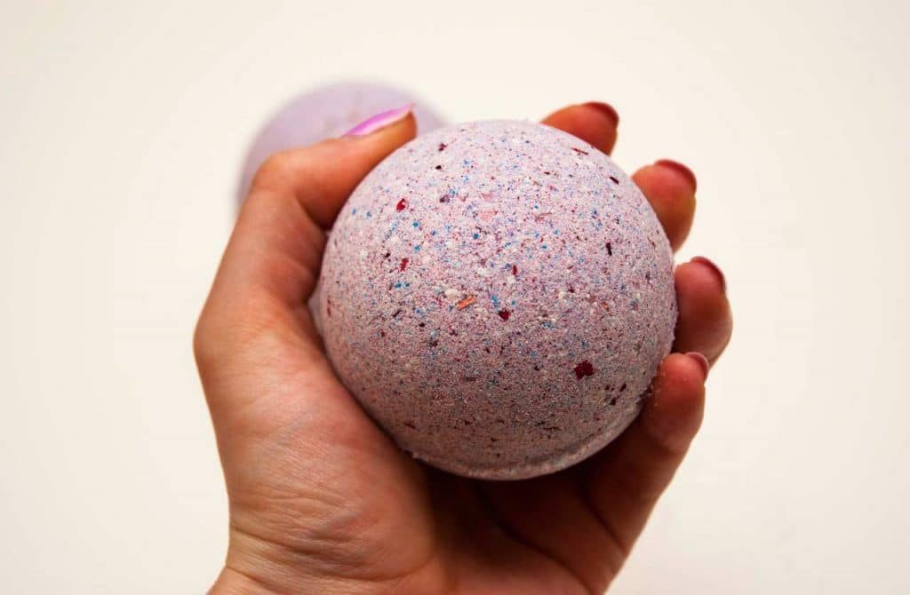 purple homemade bath bomb with rose petals purple homemade bath bomb with rose petals