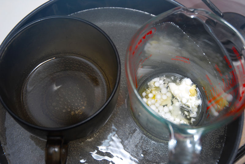 heating up ingredients in a water bath