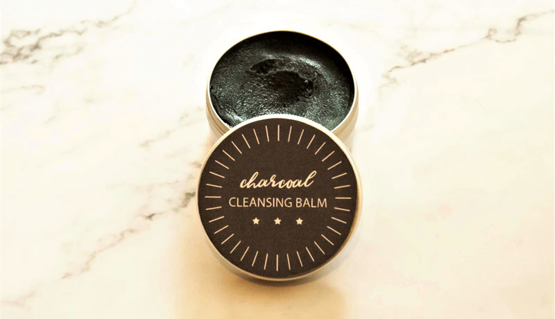 DIY charcoal cleansing balm with a label