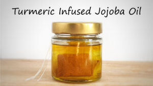Jojoba oil infused with turmeric powder