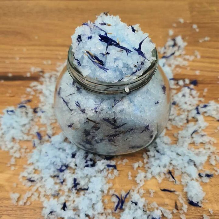 blue coconut bath salts with flower petals